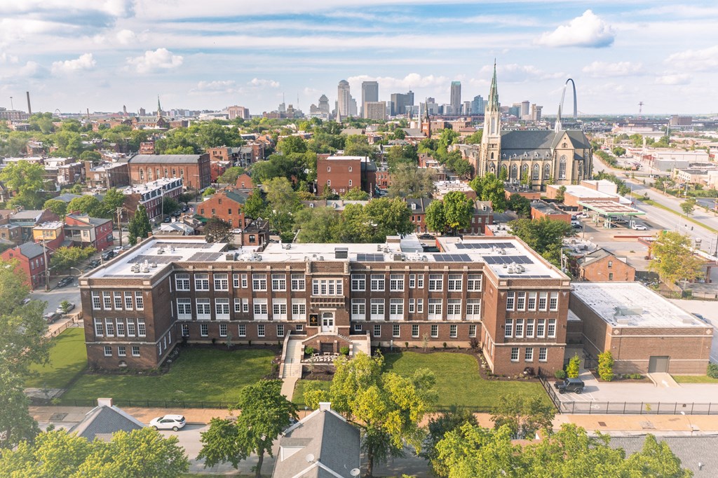 an aerial view with the city in the background
