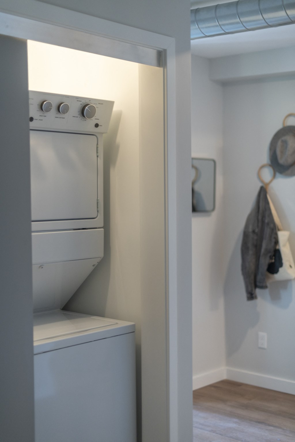a small laundry room with a washer and dryer