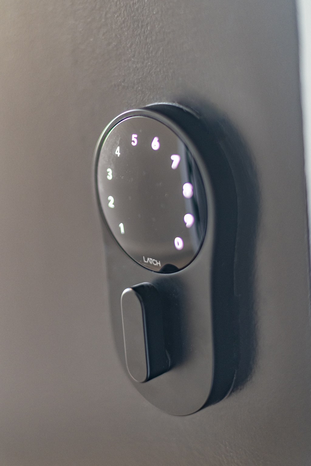 a close up of a door handle with a light on it