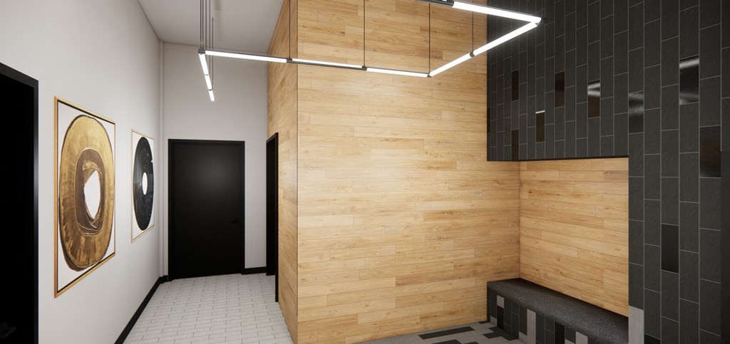 a bathroom with wood and black tile walls and a bench