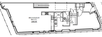 A floor plan of a property with a kitchen, living room and two bathrooms.