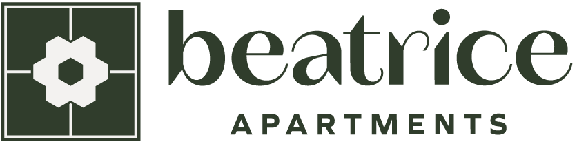 the logo for the academy apartments apartments logo with a green background and the word academy