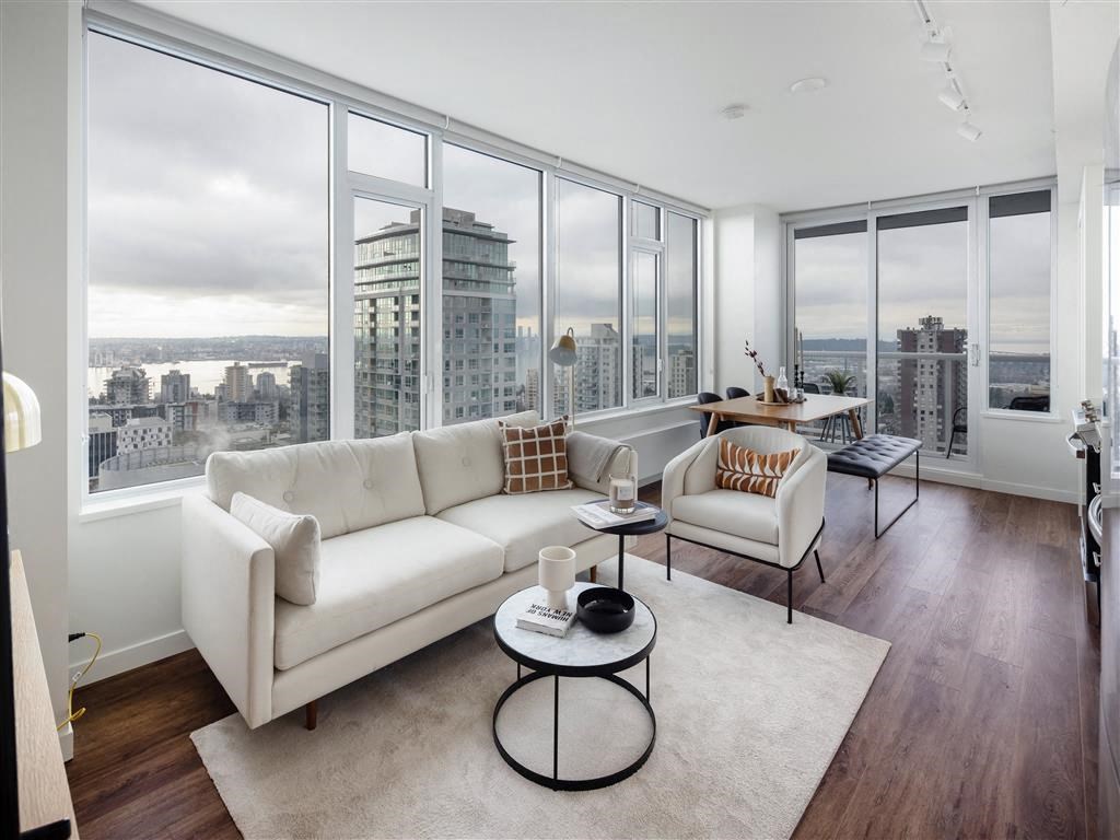 a living room with a view and a couch and a table