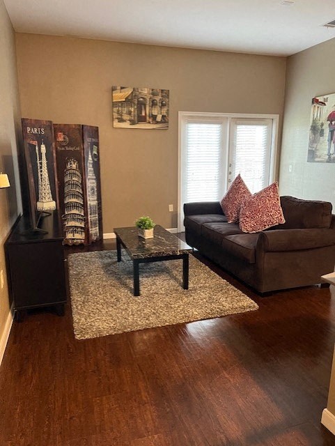 a living room with a couch and a table