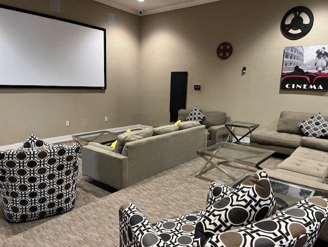 a living room with couches and a projector screen