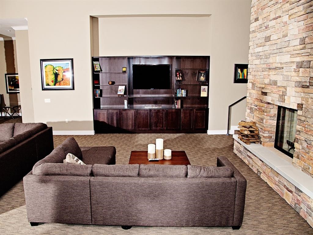 a living room with a couch and a television