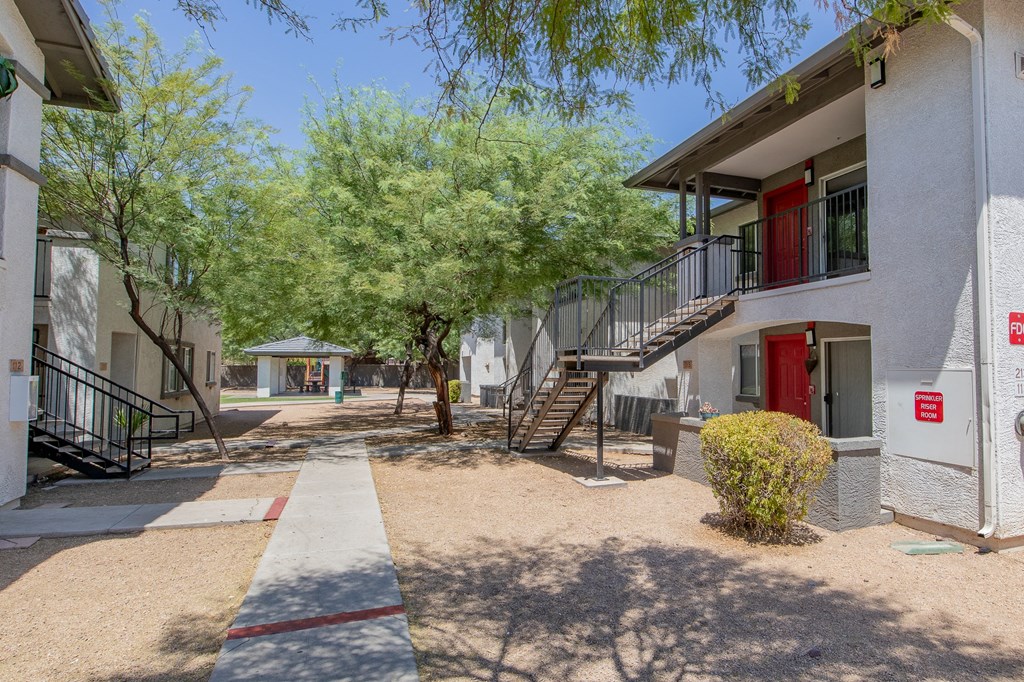 our apartments offer a courtyard with trees and a gazebo