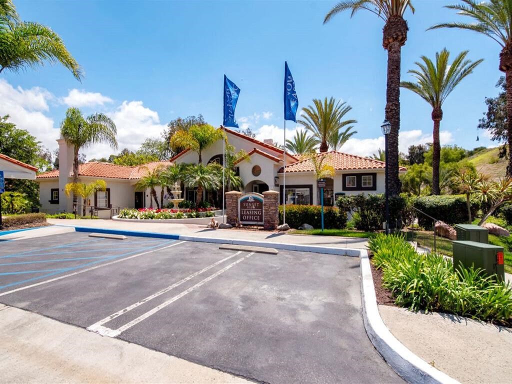 a house with a swimming pool in front of it