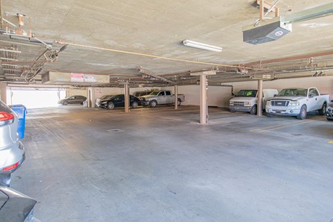 a parking garage with cars parked in it