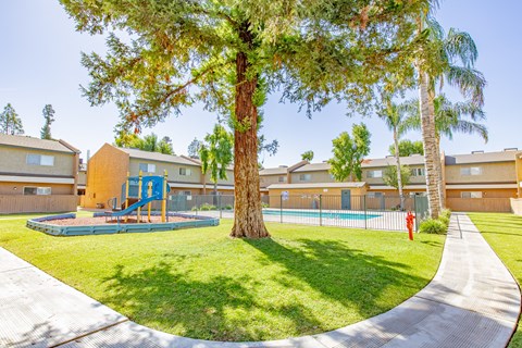 our apartments have a spacious yard with a playground and a pool