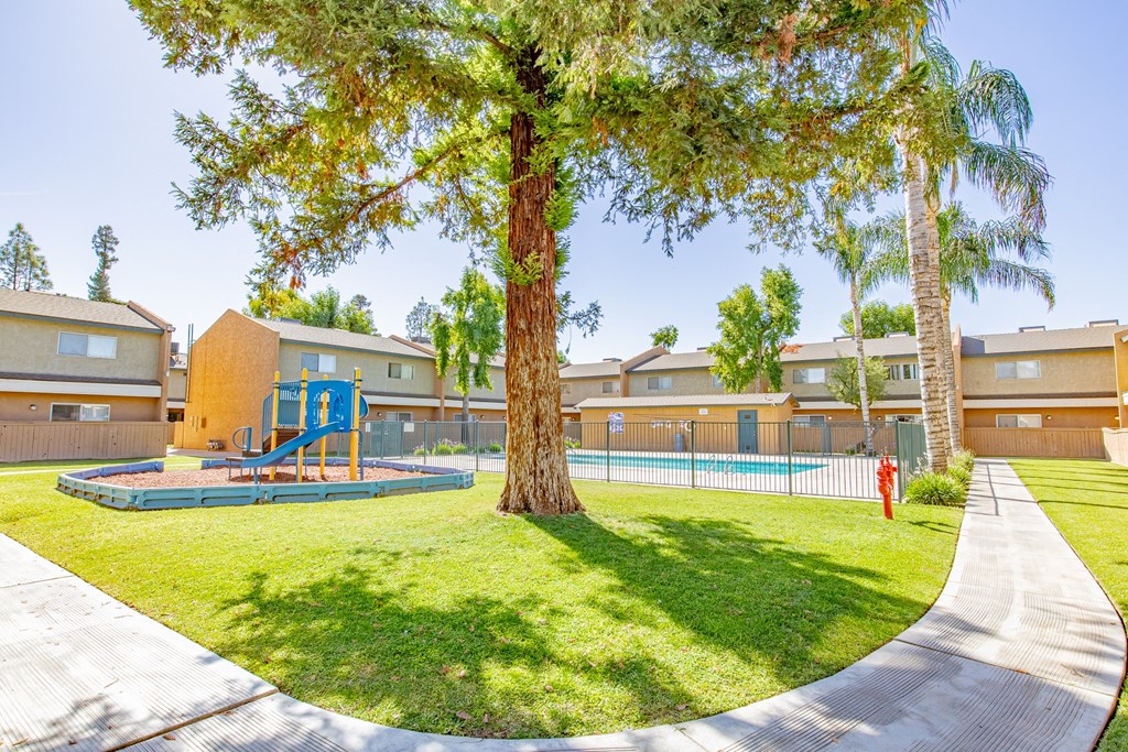 our apartments have a spacious yard with a playground and a pool