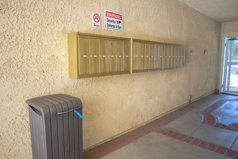 a room with a radiator and a no smoking sign on the wall
