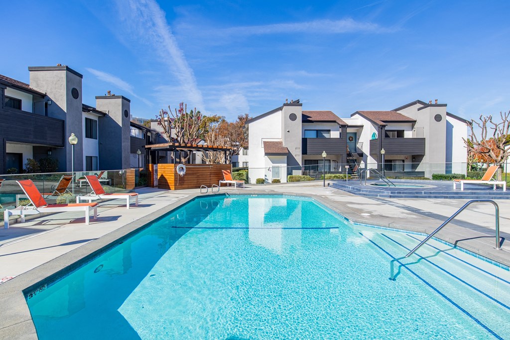 our apartments have a large swimming pool with apartments in the background