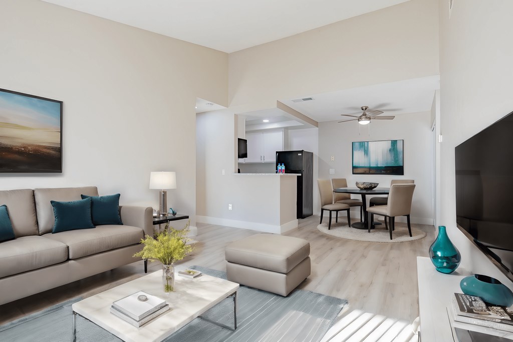 a living room with a couch and a table