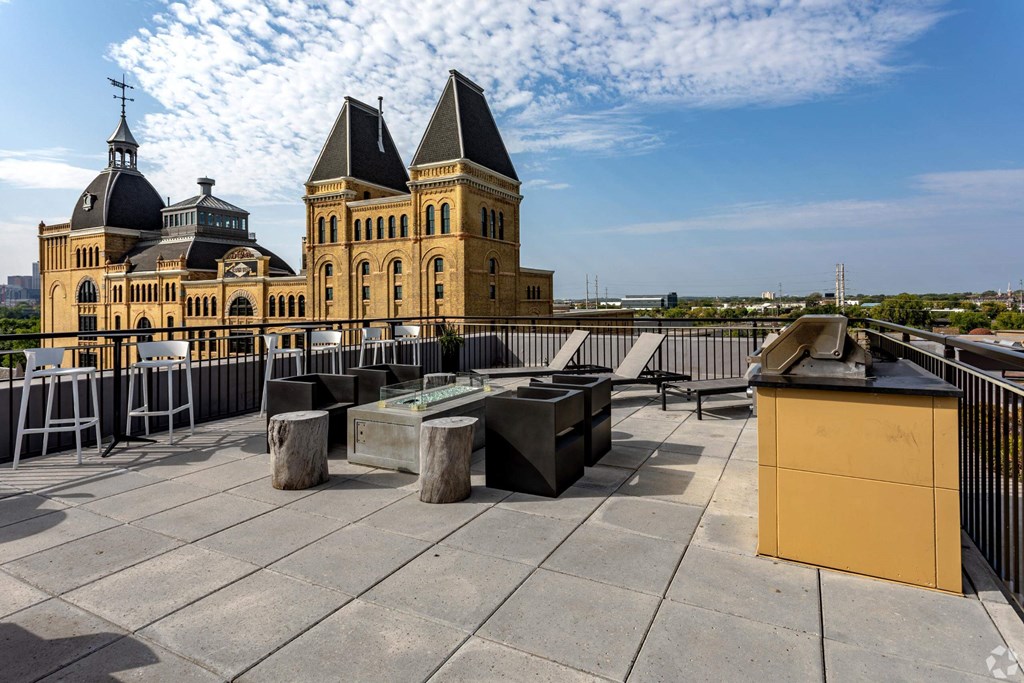 a view of a city with buildings and benches