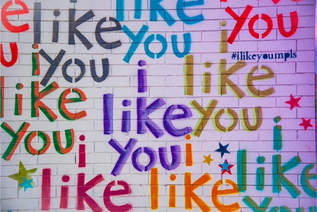 a mural with the words like you like you on a wall