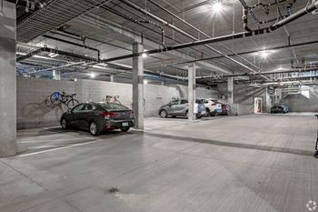 a parking garage with cars parked in it