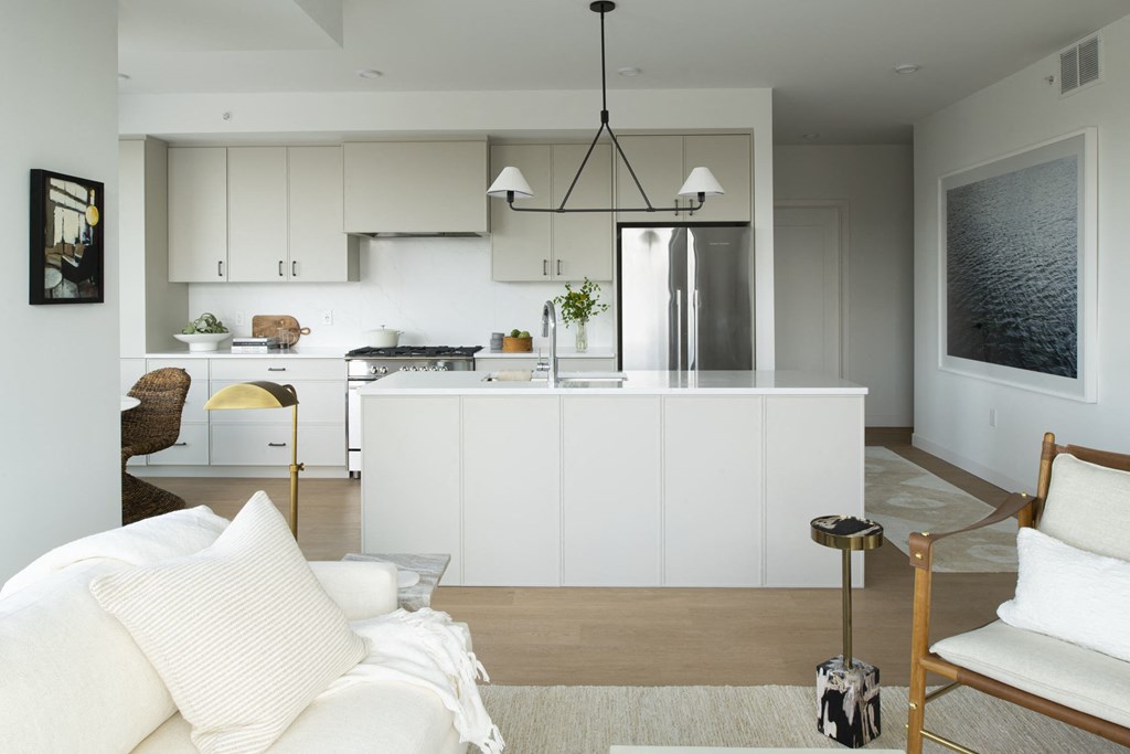 a kitchen and living area in a 555 waverly unit