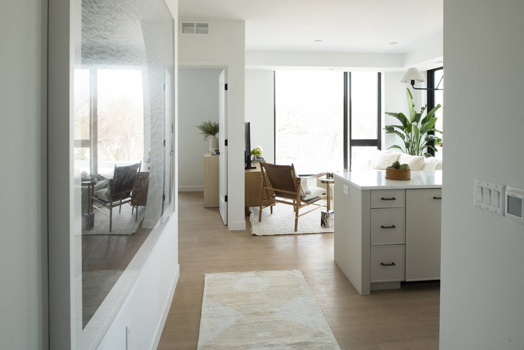 a view of the living room and dining room from the kitchen