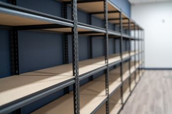 Empty shelves in a storage room.