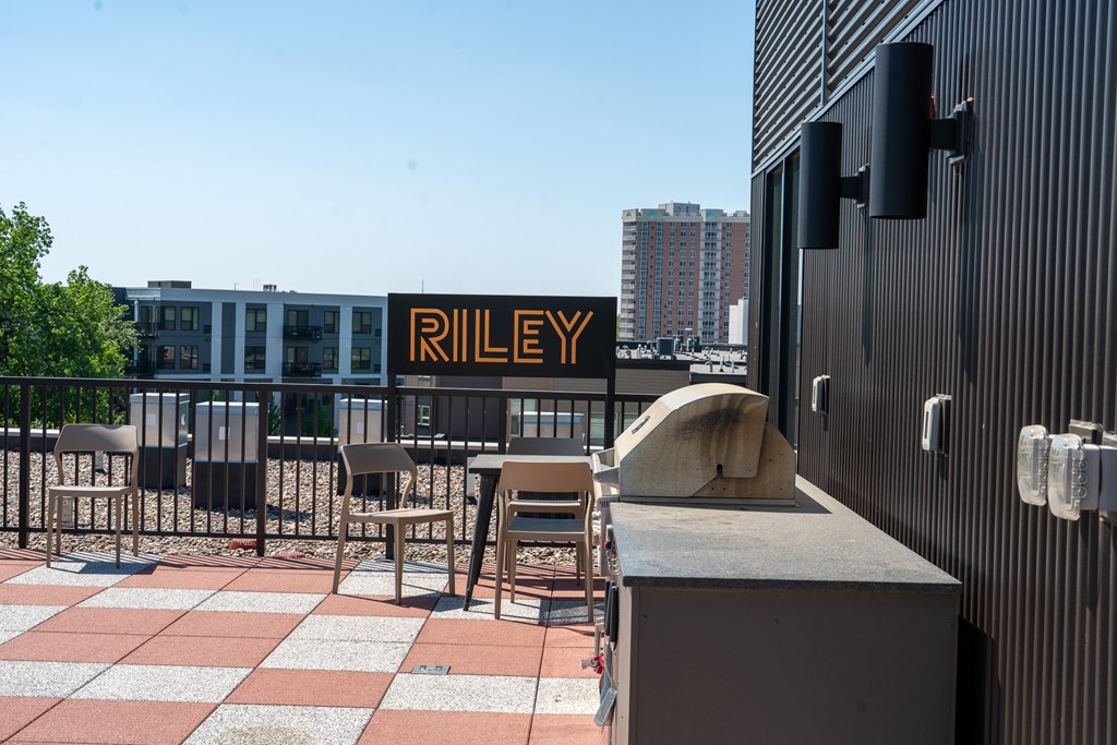 A Riley sign is displayed on a building.