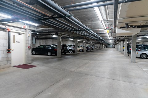 a parking garage with cars parked in it