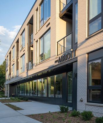 A modern building with the name "ABBOT" on the front.