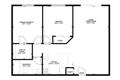 A floor plan of a home with a living/dining room, kitchen, two bedrooms, and a bathroom.