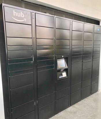 a set of industrial lockers with a hub logo on the door