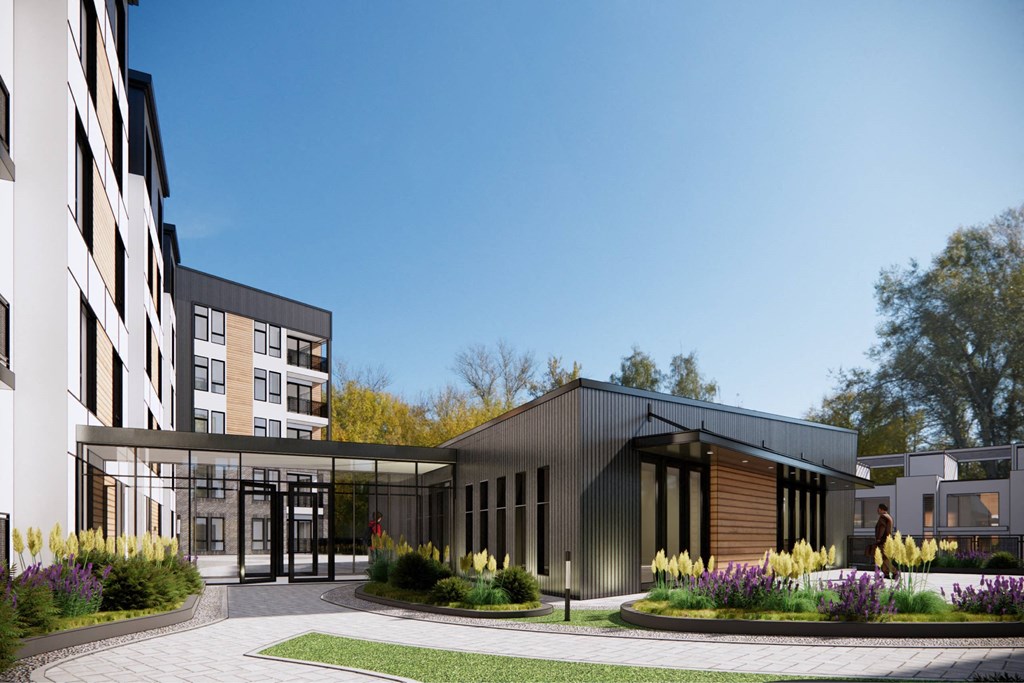 a rendering of a building with a courtyard in front of it