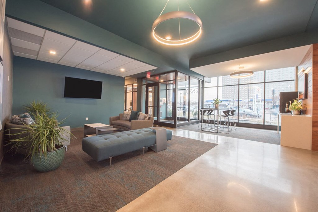 a living room with couches and a tv