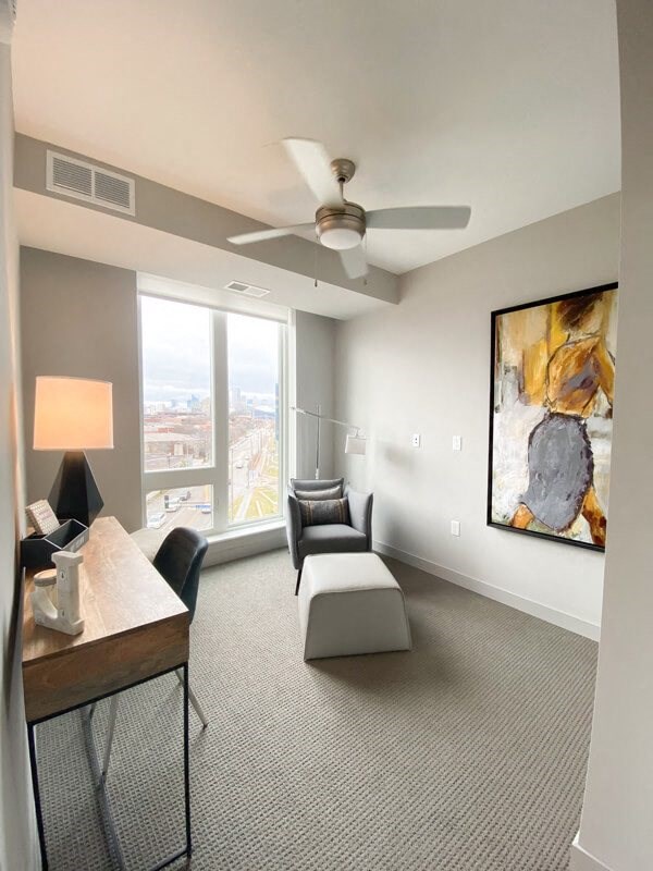 a living room with a couch and a table