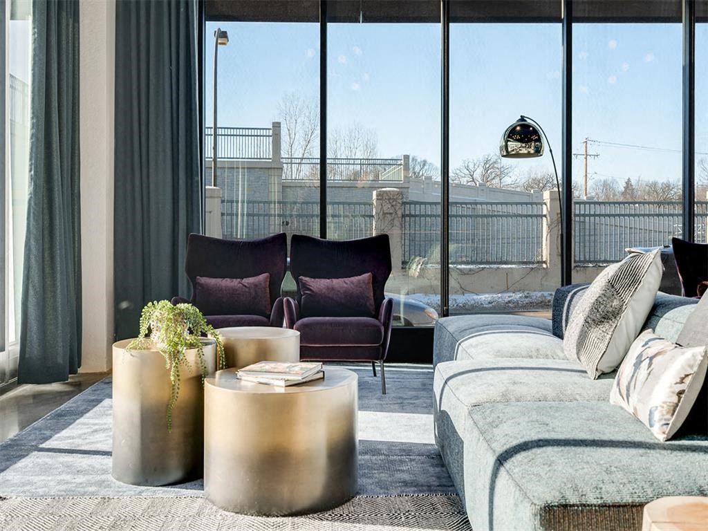 Living room with natural light leading to balcony