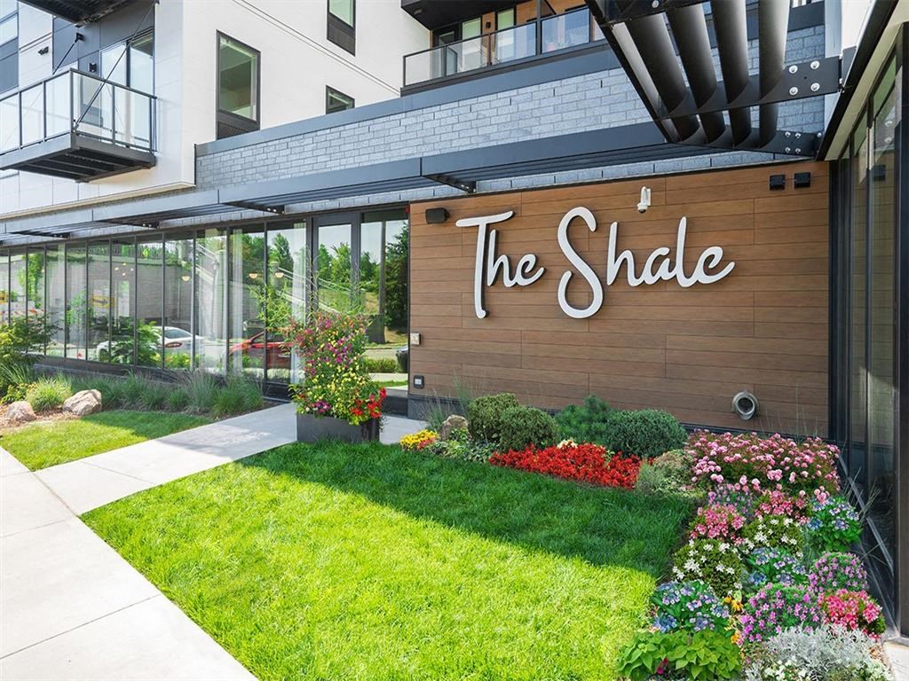 the facade of a building with a sign for the shade