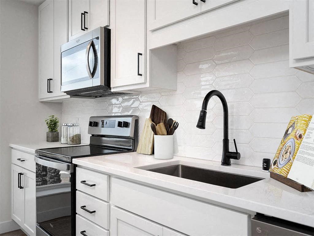a kitchen with a sink and a microwave