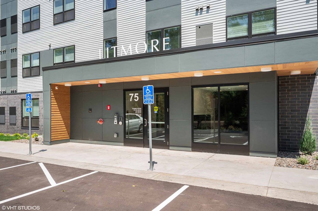 A modern building with the name ITMORE on the facade.