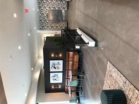 a view of the lobby from the top of the stairs