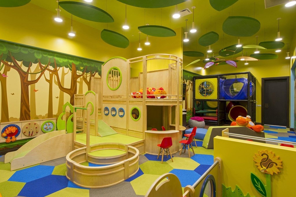 colorful children's playroom with toys and activities