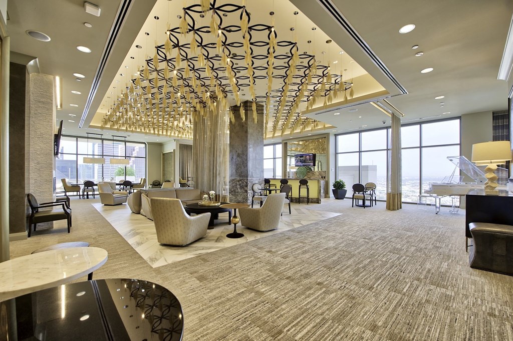 The sky lounge with seating and bar on the rooftop of Market Square Tower in downtown Houston