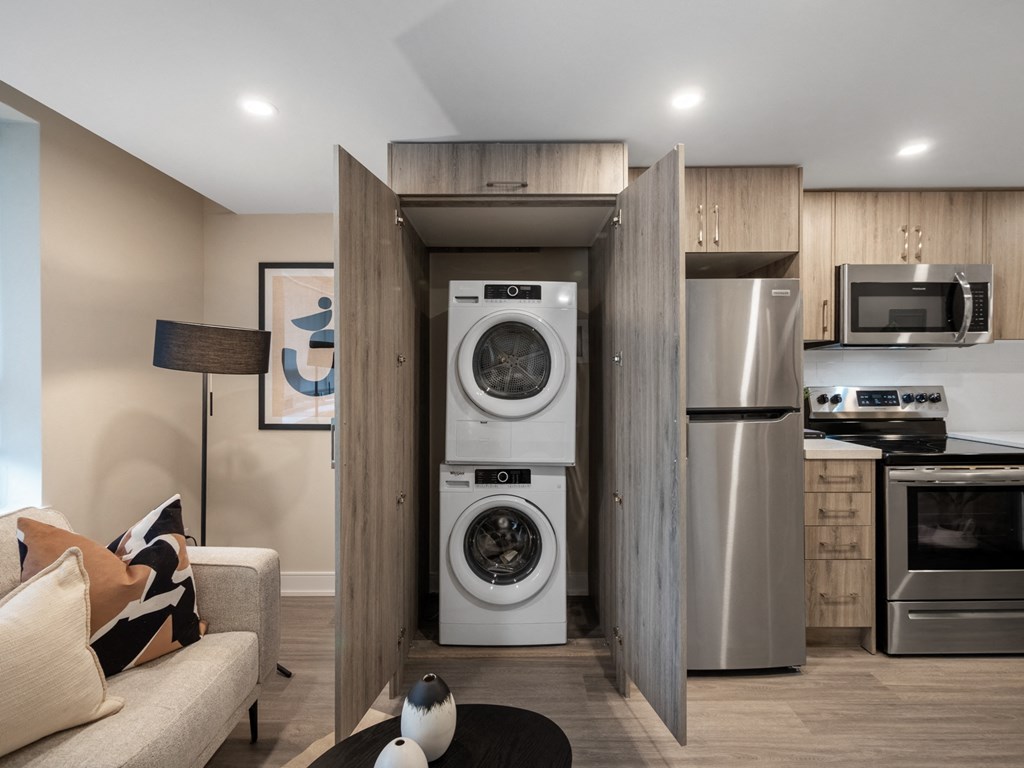 a small laundry room with a washer and dryer