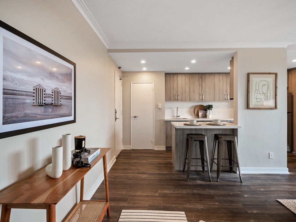 a kitchen and dining area in a 555 waverly unit