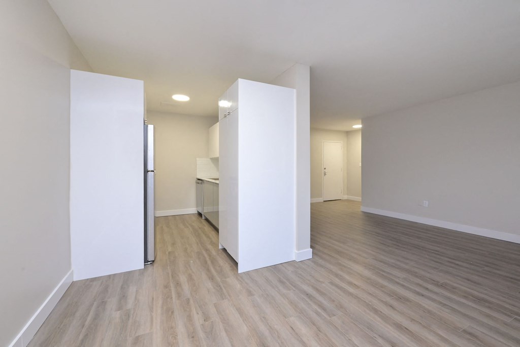 a kitchen and living room in a 555 waverly unit