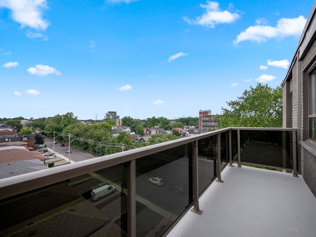 a balcony with a view of the city