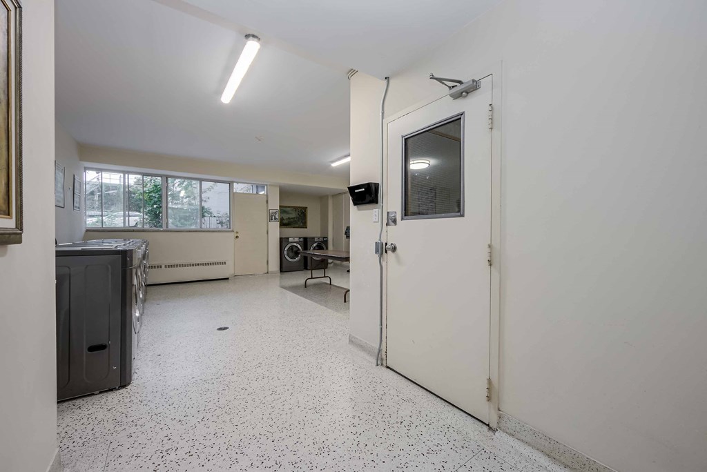 a laundry room with a washer and dryer