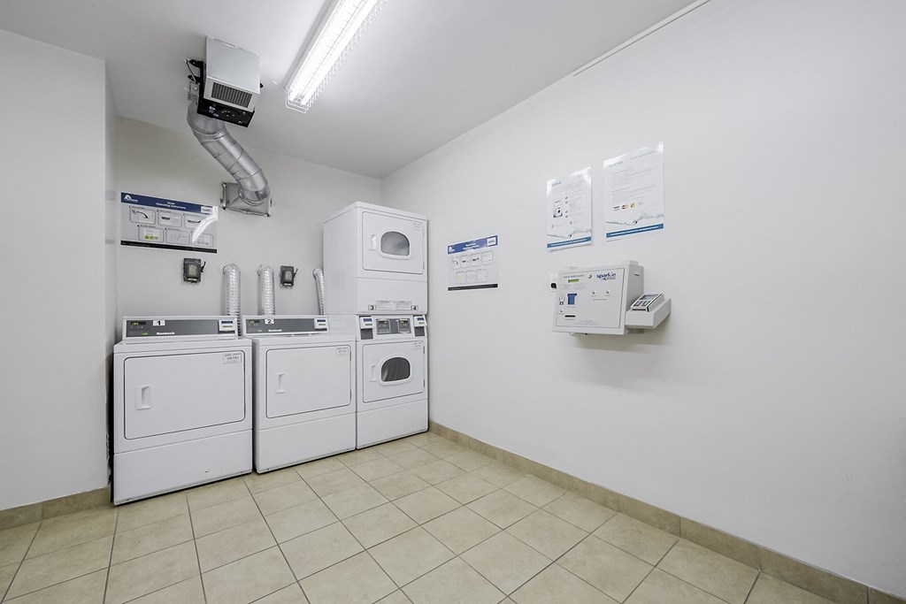 a laundry room with a washer and dryer