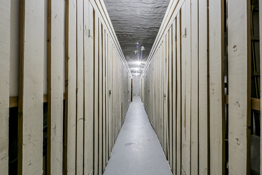 a row of wooden lockers in a storage facility