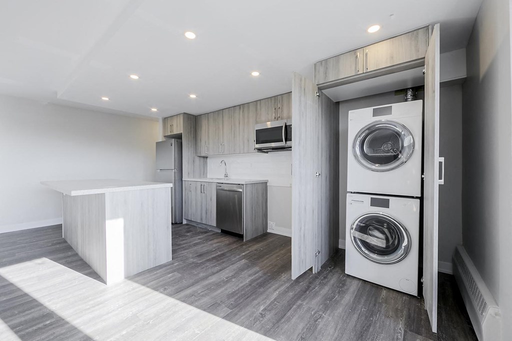 a laundry room with a washer and dryer