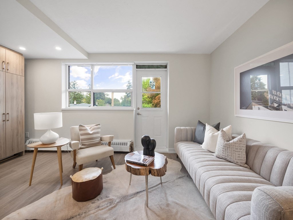 a living room with a couch and a chair