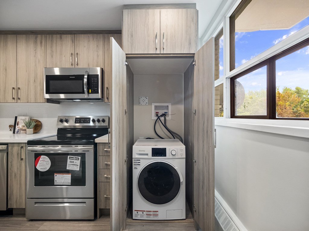 a laundry room with a washer and dryer