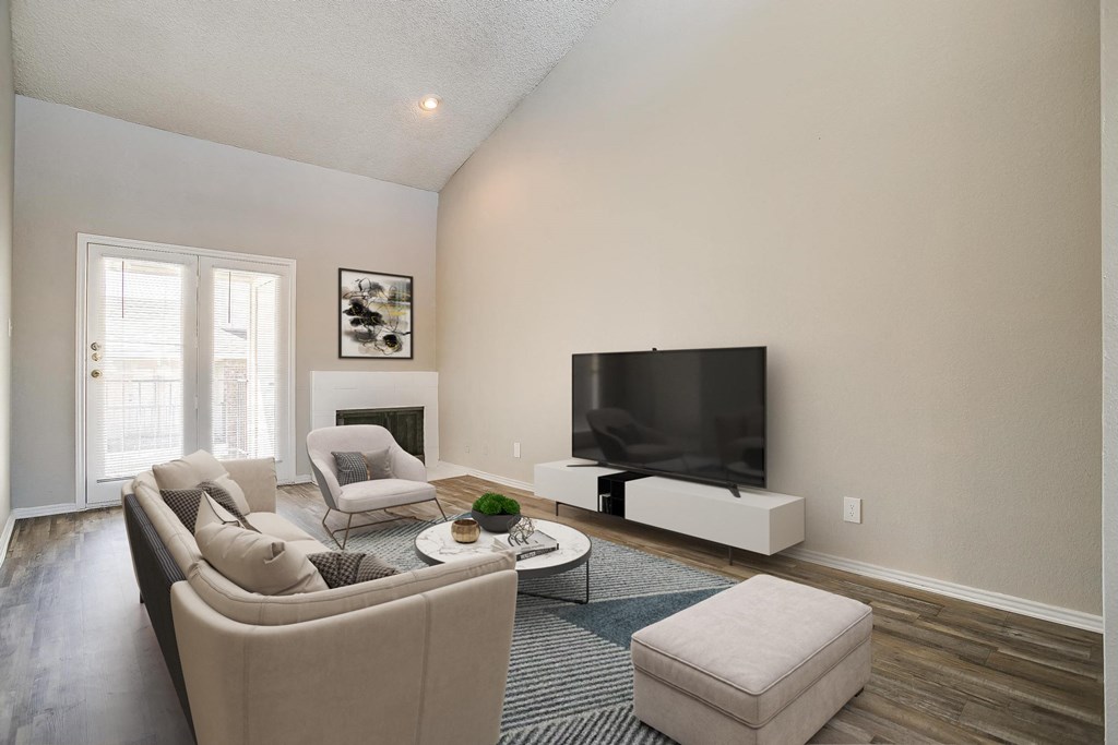a living room with a couch and a tv